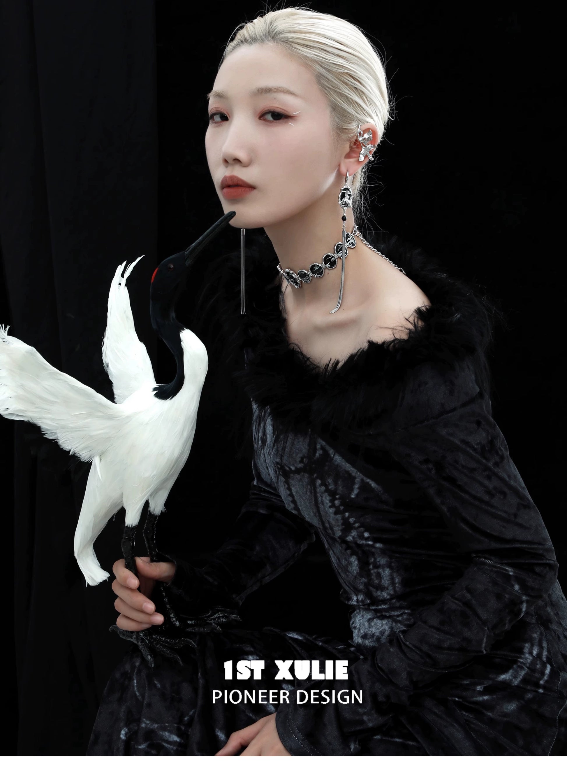 Y2K dark tassel earrings showcased on a model in a stylish black dress and accessories