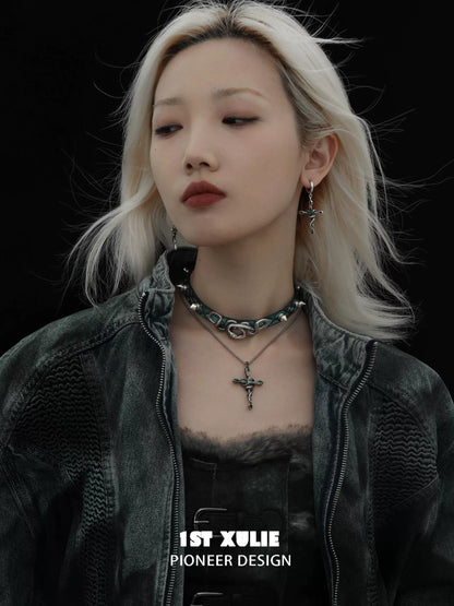 Model wearing Y2K gothic cross earrings paired with dark aesthetic outfit and choker
