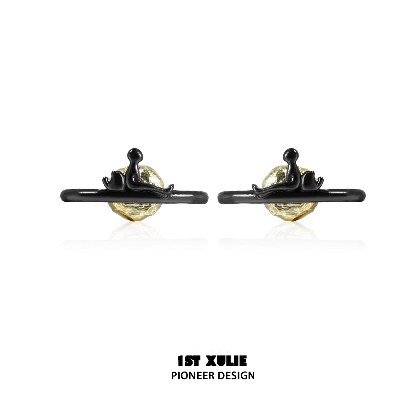 Y2K lonely dreamer earrings featuring a unique design with a gold and black finish