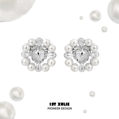 Y2K pearl earrings with intricate silver design and multiple pearl accents for a trendy look