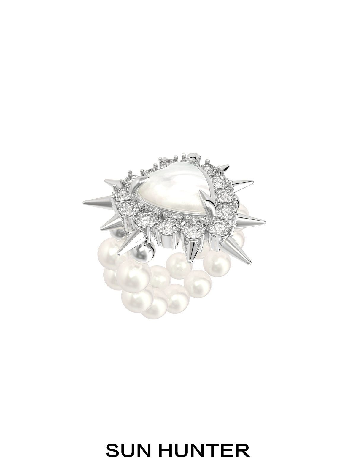 Y2K pearl rivet ring by SUN HUNTER featuring a spike design with pearl accents and a central gem