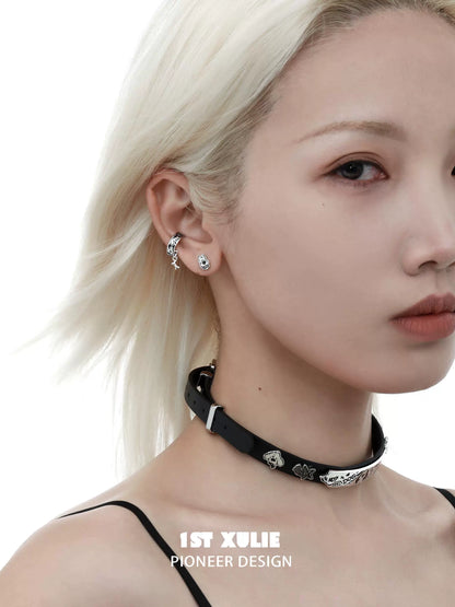 Fashionable Y2K puppy chain earrings paired with a stylish choker for a trendy look
