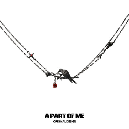 Y2K raven rose necklace with intricate design and red gemstone detailing from A PART OF ME