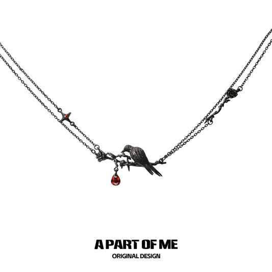 Y2K raven rose necklace with intricate design and red gemstone detailing from A PART OF ME