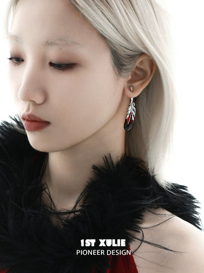 Y2K red feather earrings showcasing a trendy design, perfect for adding flair to any outfit