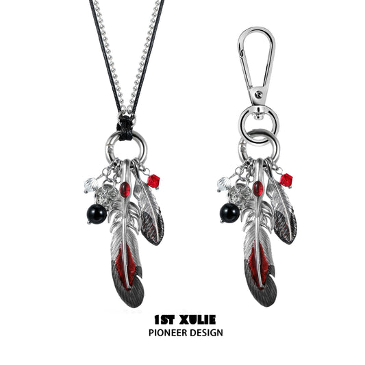 Y2K red witch feather necklace featuring silver feathers, red accents, and a detachable clasp