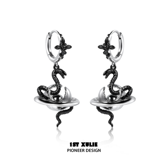 Sleek y2k snake earrings featuring a striking snake design with a shiny silver finish