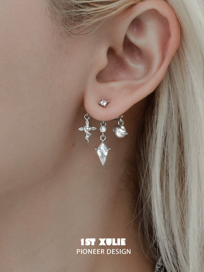 Y2K snake earrings designed by 1STXULIE featuring unique charms and a stylish look