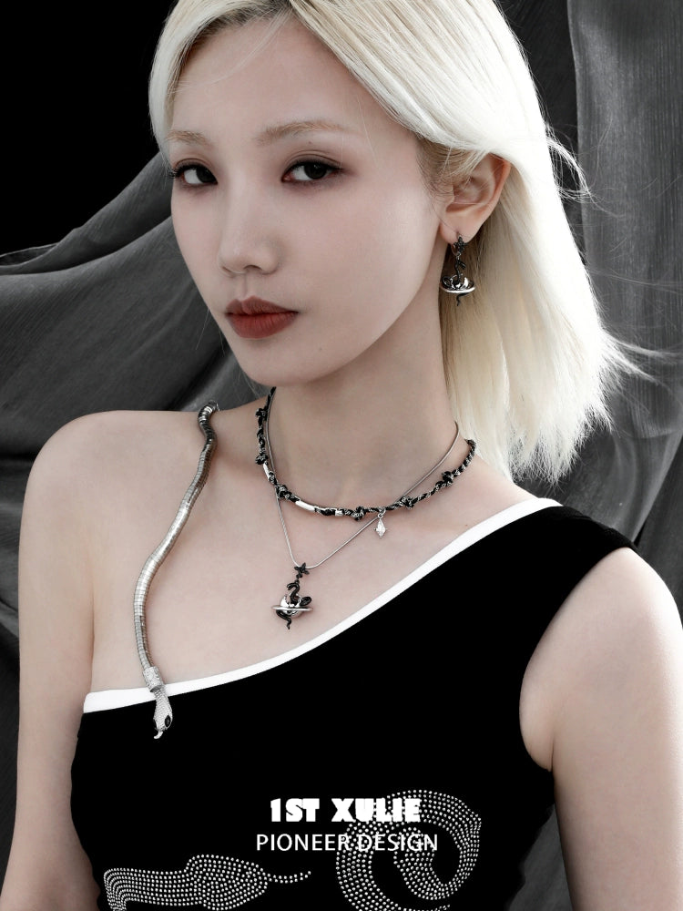 Y2K snake earrings styled with a modern outfit for a trendy look