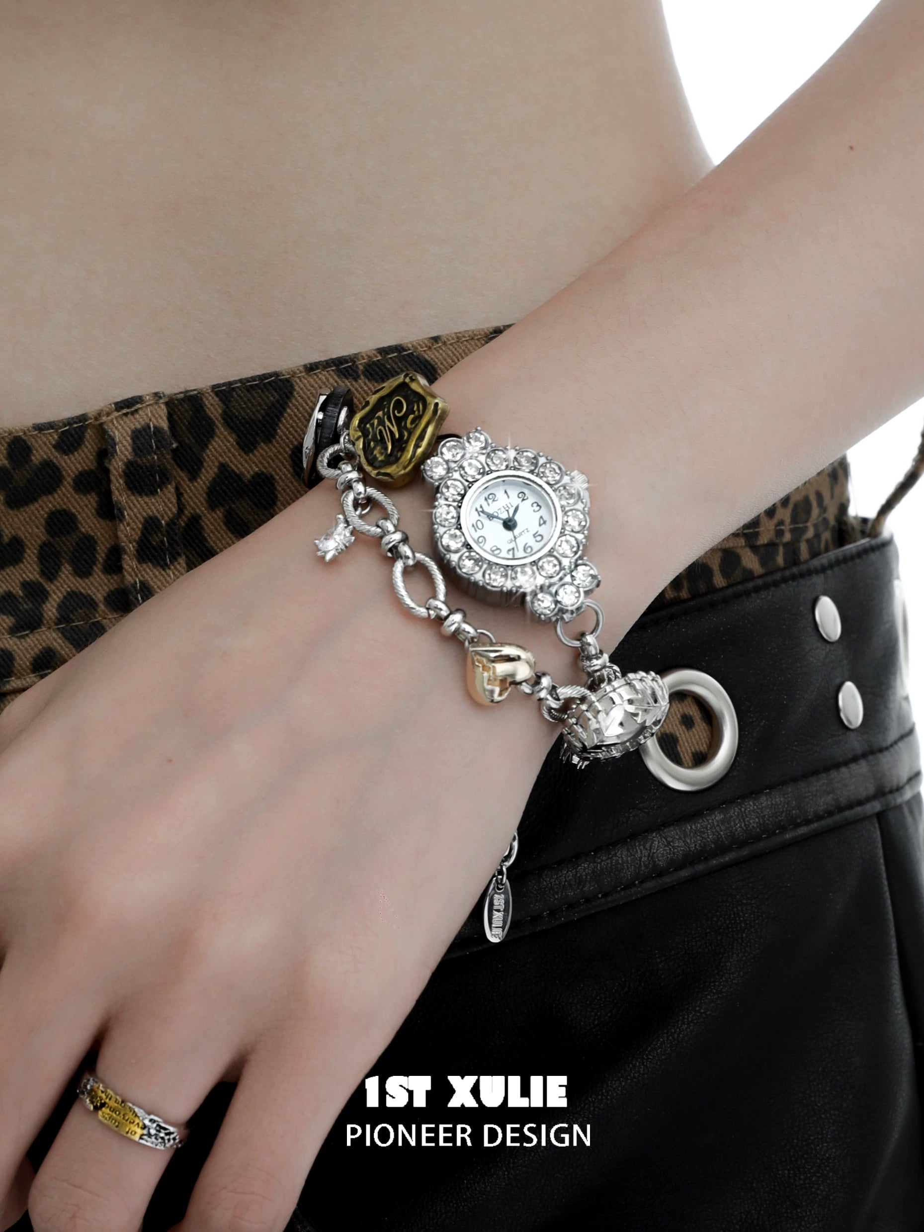 Y2K vintage bracelet watch with rhinestone accents and charm details on a wrist